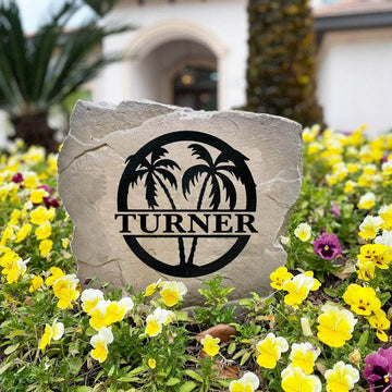 Weather-resistant palm tree family name stone designed to enhance curb appeal with a custom monogram and timeless island-inspired style.