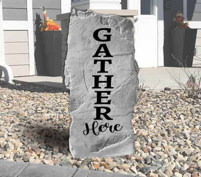 Engraved stone with Gather Here message for family gatherings
