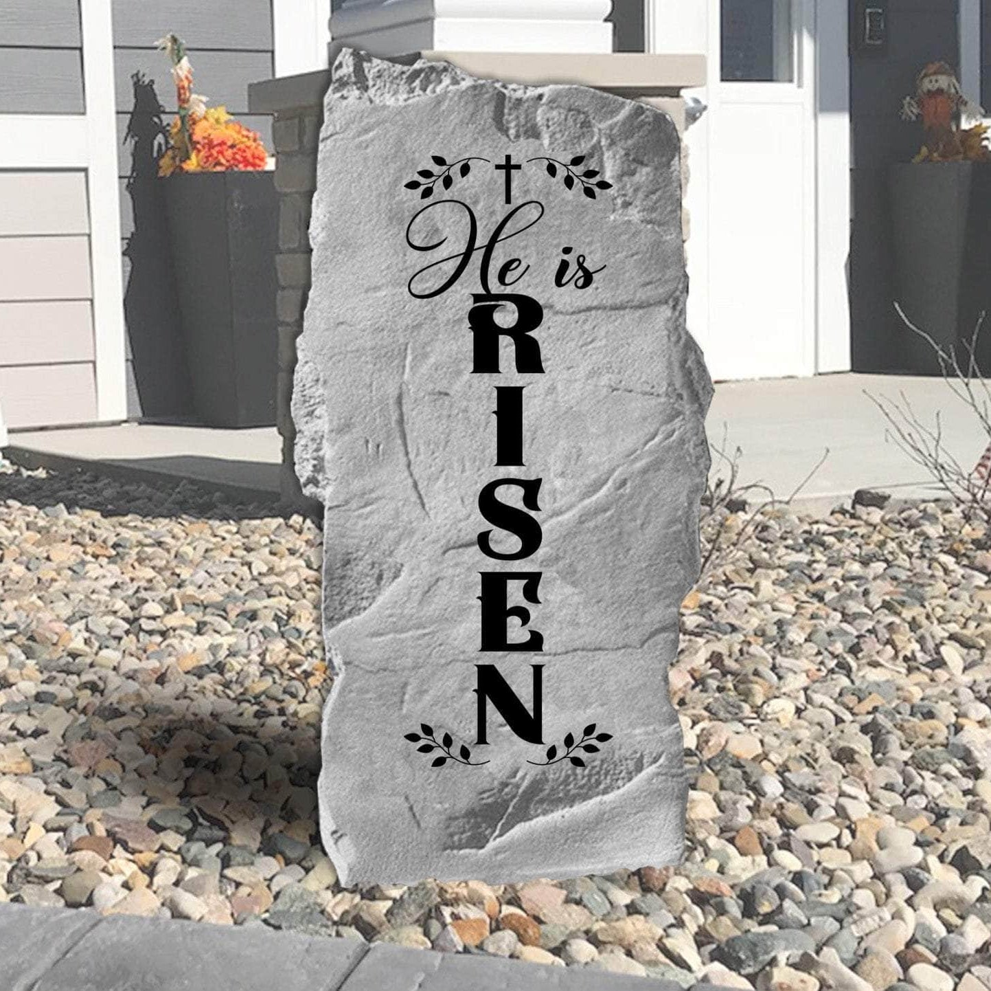 He Is Risen engraved garden stone celebrating the resurrection of Jesus Christ with a meaningful outdoor display of Christian faith and hope.