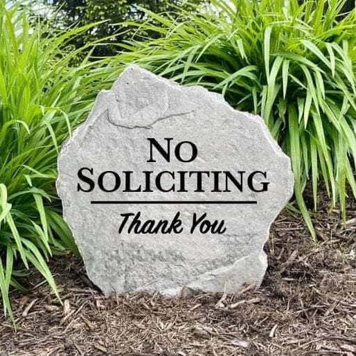 Weather-resistant No Soliciting garden stone featuring easy-to-read engraved lettering for homeowners seeking a tasteful alternative to traditional signs.
