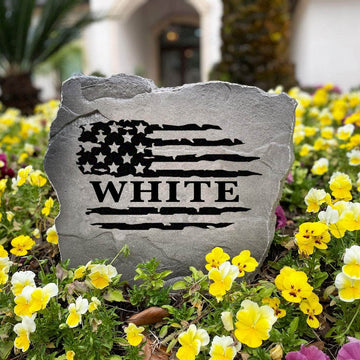 Premium patriotic lawn stone featuring a personalized surname and classic Stars and Stripes design, making a welcoming addition to any residential landscape.