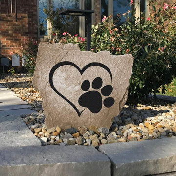 Weather-resistant heart paw print monument designed to honor the special bond between pets and their families with lasting outdoor beauty.