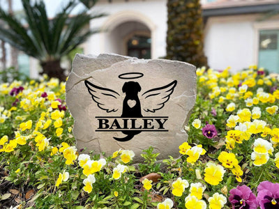 Decorative pet memorial stone with dog silhouette and monogram