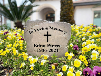 Personalized memorial stone featuring cross and custom dates.