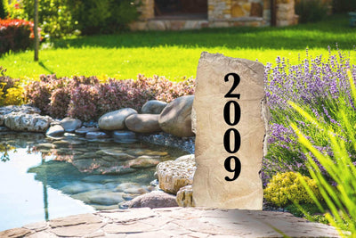 Rustic vertical concrete address stone for landscaping entryway