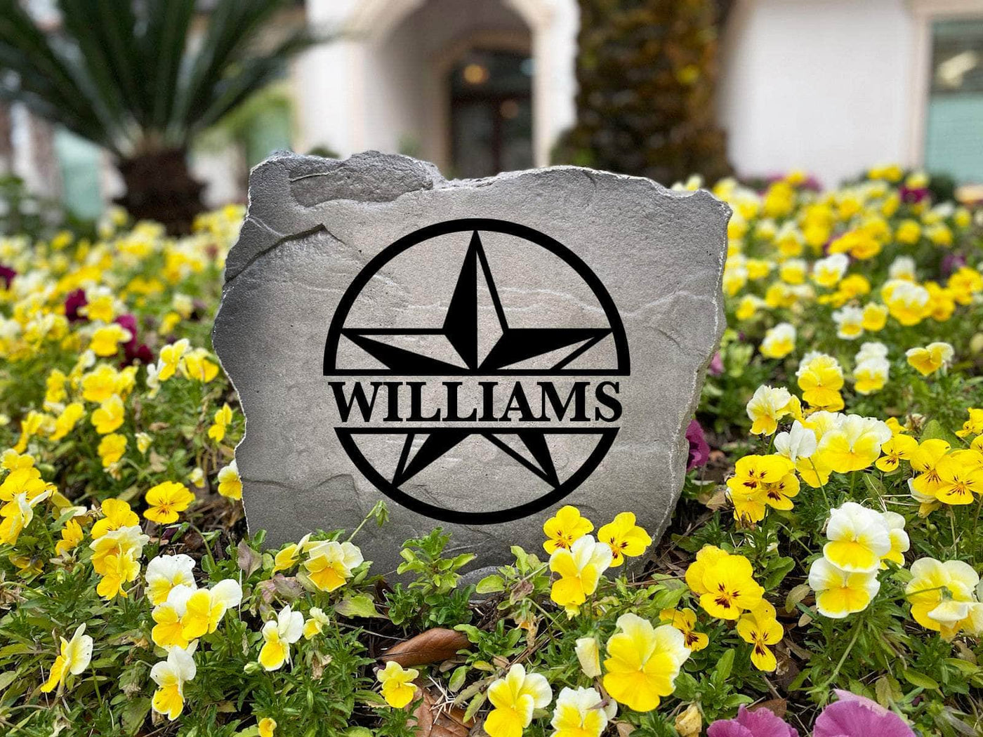 Outdoor landscaping stone with custom star family name monogram