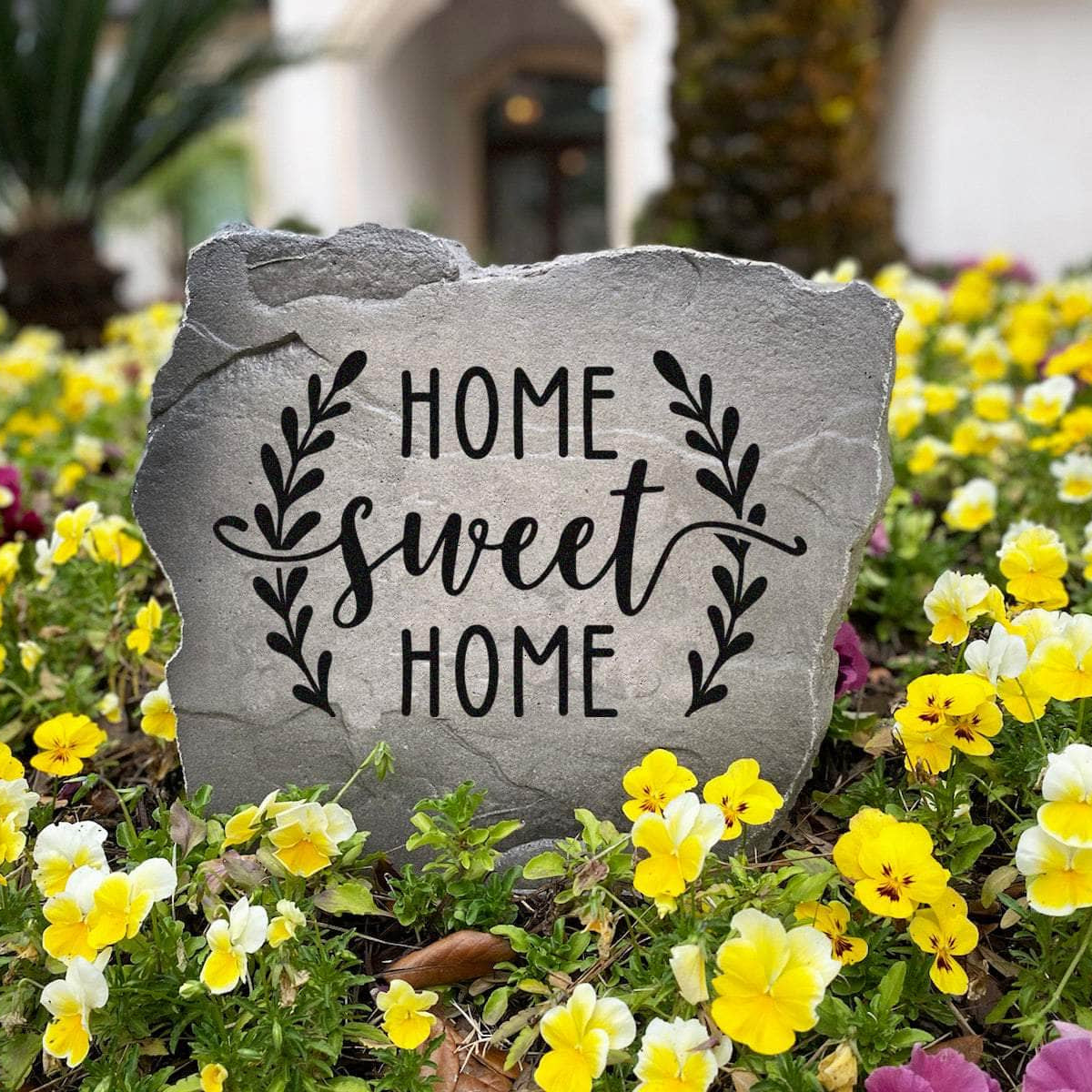 Weather-resistant Home Sweet Home monument bringing cozy farmhouse-inspired character and lasting beauty to residential landscapes year-round.