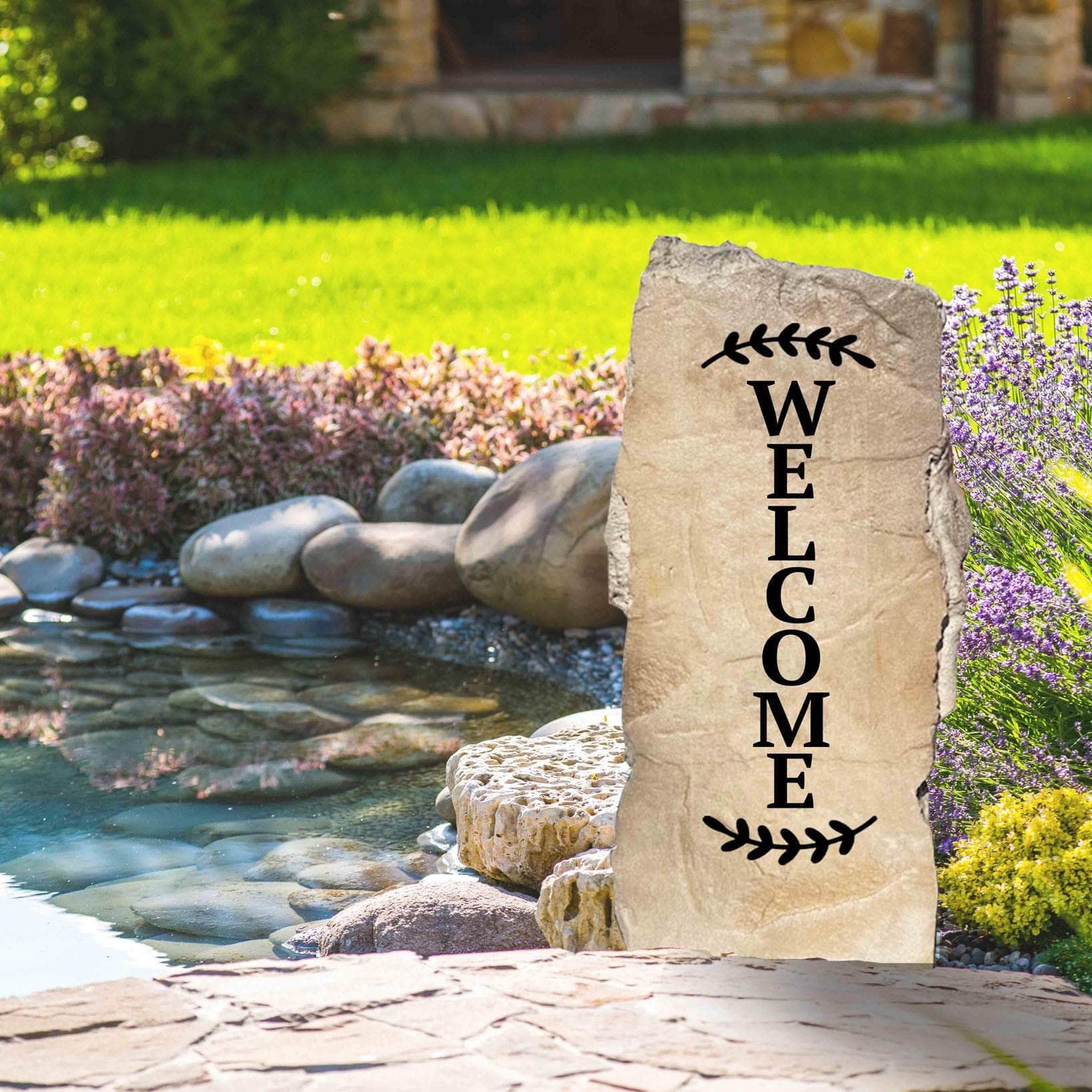 Decorative upright welcome garden stone featuring classic engraved lettering that complements flower beds, patios, and front yard landscaping.