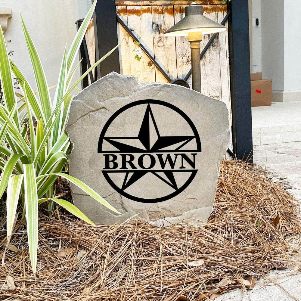 Decorative monogram landscape stone featuring a classic star design, perfect for enhancing flower beds, patios, walkways, and home entrances.