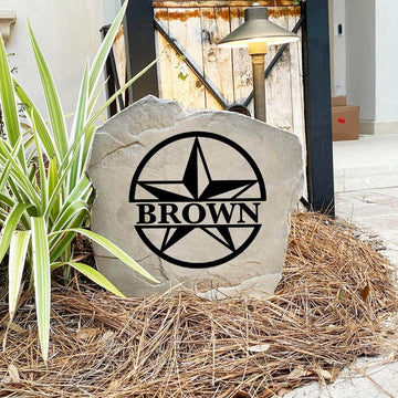 Decorative monogram landscape stone featuring a classic star design, perfect for enhancing flower beds, patios, walkways, and home entrances.