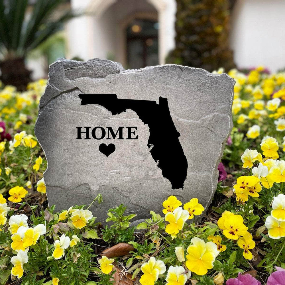 Weather-resistant personalized state lawn stone crafted to add character and regional pride to flower beds, entryways, and backyard living spaces.